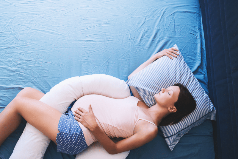 Pregnant and snoring use a pregnancy pillow
